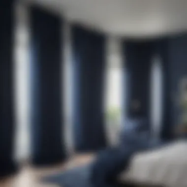 Installation of navy blue curtains in a modern bedroom